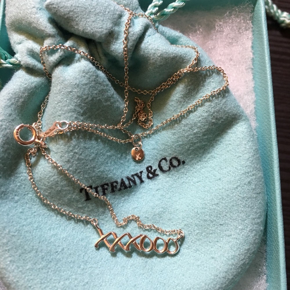 Tiffany kiss and love necklace